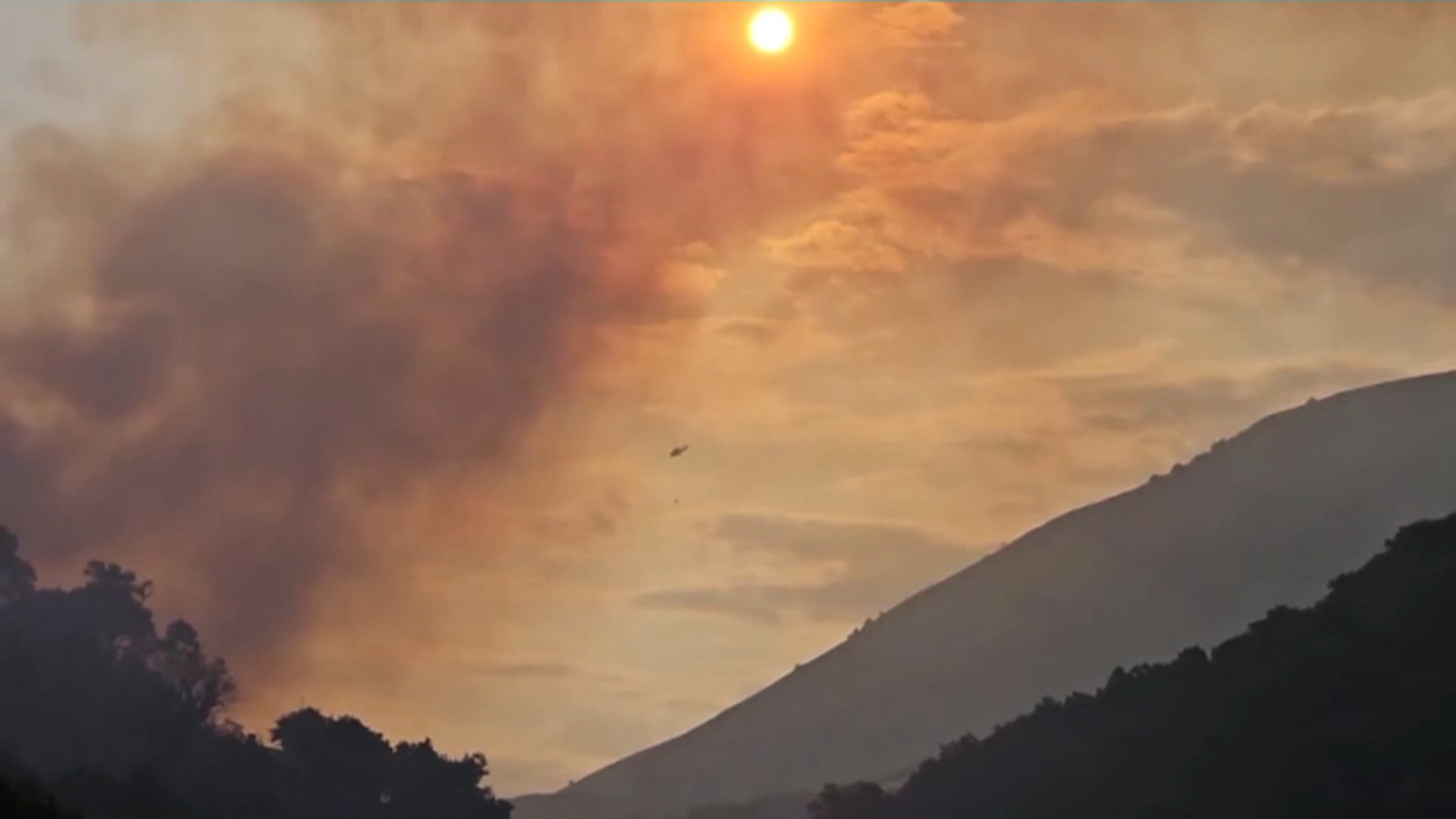 Smoke rises from wildfires burning in a remote part of the southern district of Dropull, Albania on 11 July 2024. Photo: EBU