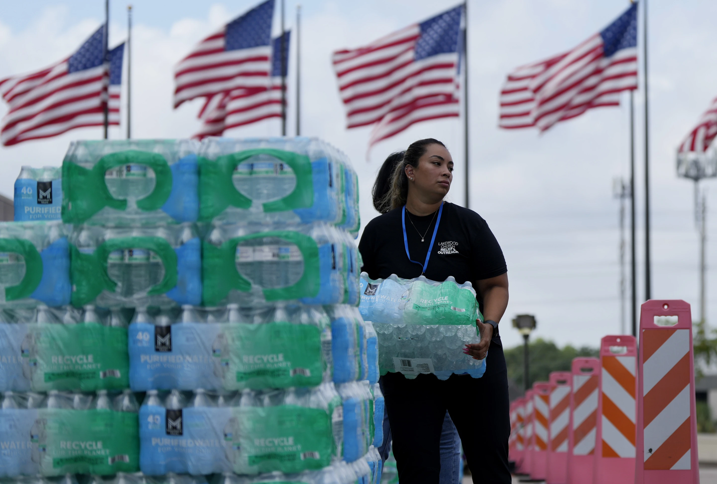 Staff at Lakewood Church hand out water and operate a cooling station in Houston, Tuesday, 9 July 2024. The effects of Hurricane Beryl left most in the area without power. Photo: Eric Gay / AP Photo