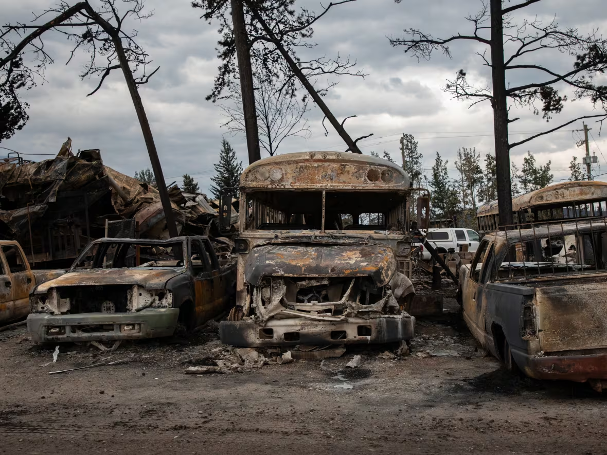 A line of wildfire-scorched, burned-out vehicles are seen in Jasper, Alberta, Canada on Friday, 26 July 2024. Photo: Amber Bracken / The Canadian Press