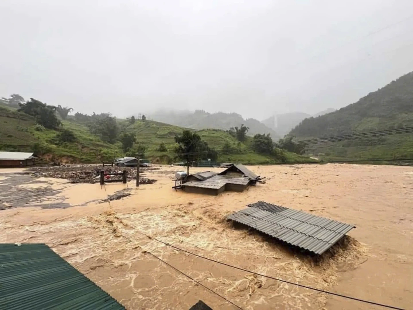 Houses are submerged in flood after typhoon Yagi hit Yen Bai province, northwestern Vietnam on Sunday, 8 September 2024. Photo: Do Tuan Anh / VNA / AP